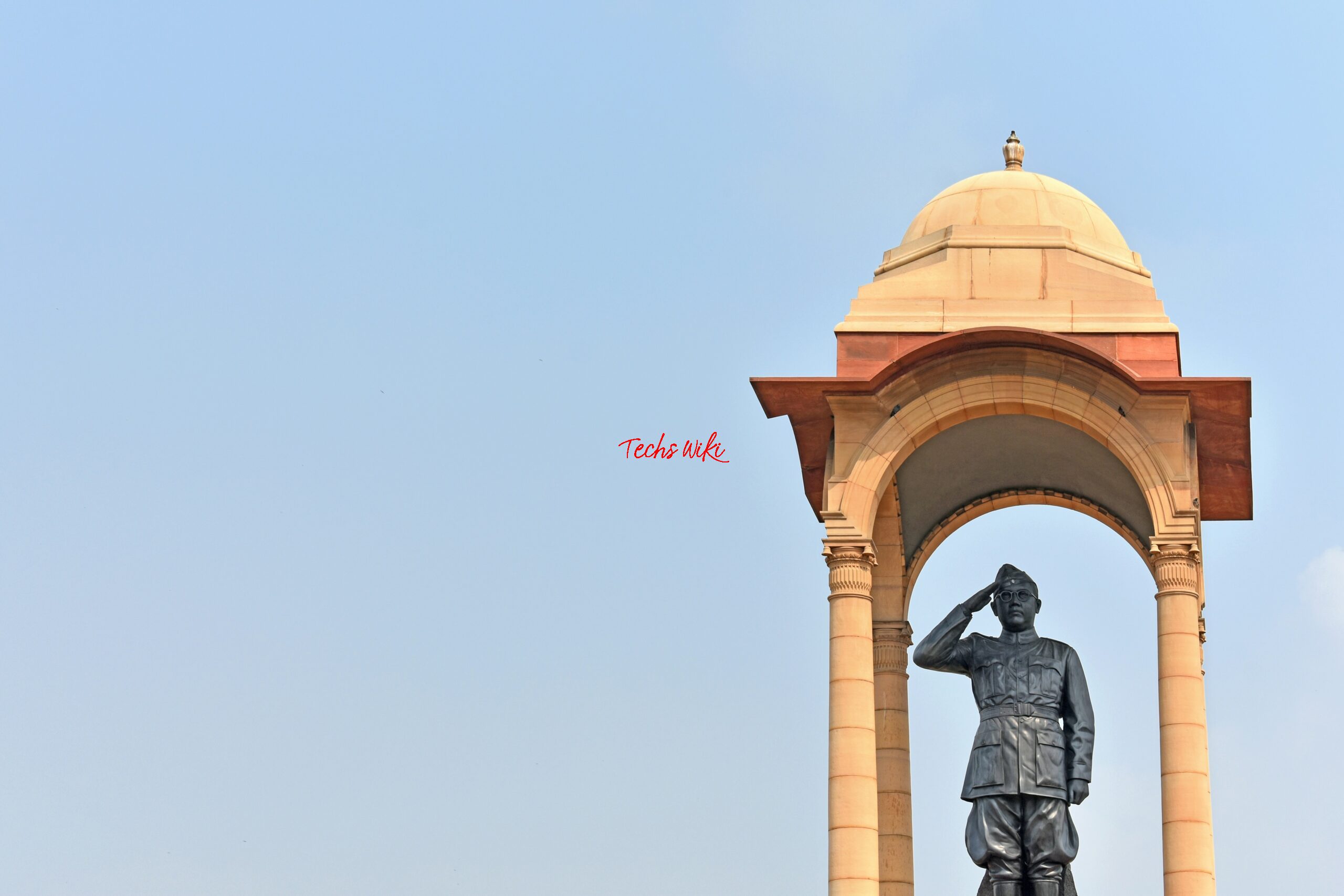 a statue in front of a building